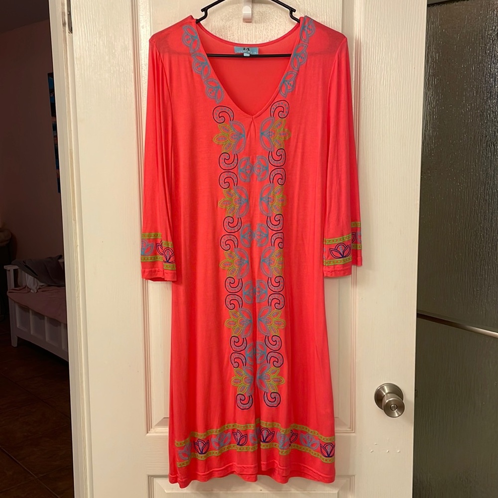 Beautiful coral dress with multi color detail. Lightweight material.